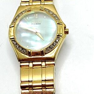 Citizen Eco-Drive Womens Watch Gold Tone Diamond Chip Bezel Mother of Pearl Dial